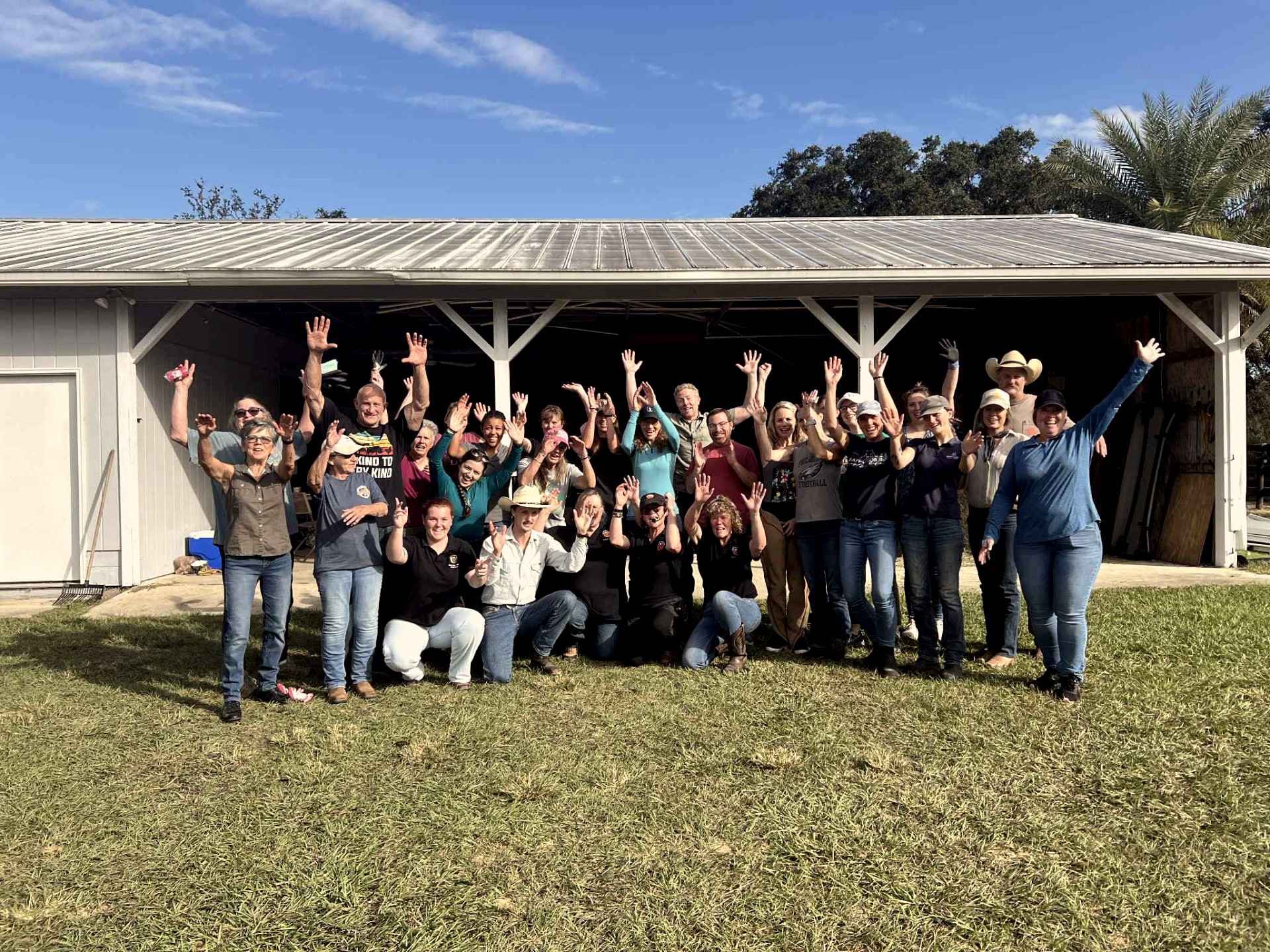 HM workshop group celebrating together outside the venue